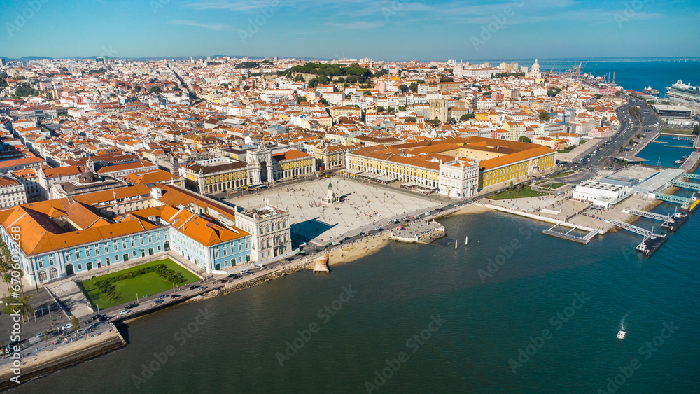 Aerial drone point of view of Commercio Square, Downtown Lisbon, Portugal. Panoramic view of cold city center. Travel destination visited annually by many foreigner tourists. 
