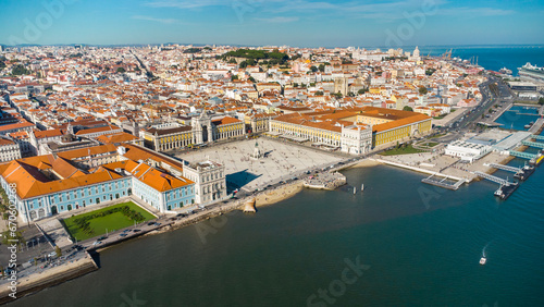 Aerial drone point of view of Commercio Square, Downtown Lisbon, Portugal. Panoramic view of cold city center. Travel destination visited annually by many foreigner tourists. © alexemarcel