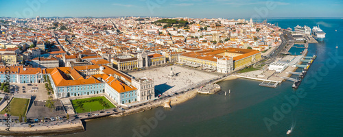 Aerial drone point of view of Commercio Square, Downtown Lisbon, Portugal. Panoramic view of cold city center. Travel destination visited annually by many foreigner tourists.  photo