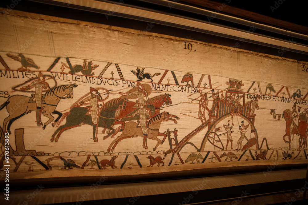 BAYEUX, FRANCE - AUGUST 25, 2022 Detail of the Bayeux Tapestry depicting the Norman invasion of England in the 11th Century