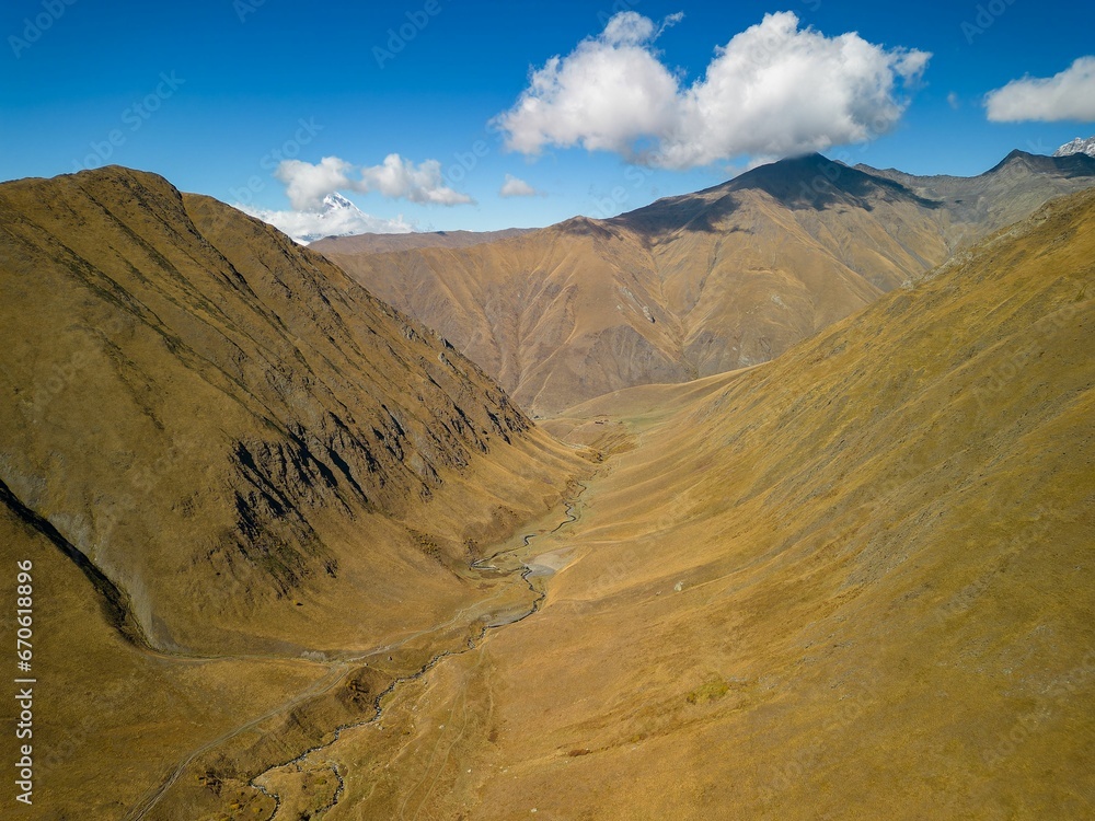 Naklejka premium Beautiful shot of a canyon near Mount Chaukhi in the village of Juta, Georgia
