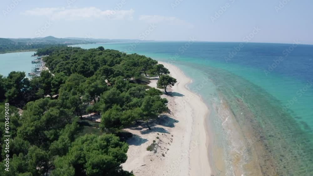 Aerial drone view of Port Glarokavos and lagoon beach in Kassandra penisula Chalkidiki Greece. Lagoon drone view blue sea Greece. Aerial drone view of Port Glarokavos and lagoon beach in Kassandra penisula Chalkidiki Greece. Lagoon drone view blue sea Greece.