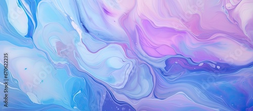 A backdrop of abstract fluid art displaying an iridescent paint effect and splashes created using acrylic