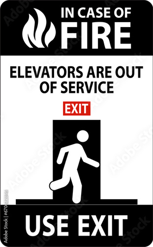 In Case Of Fire Sign Elevators Are Out of Service, Use Exit