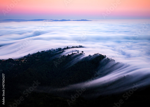 Thick / Dense Fog Rolling Over Hills / Homes in San Francisco Bay