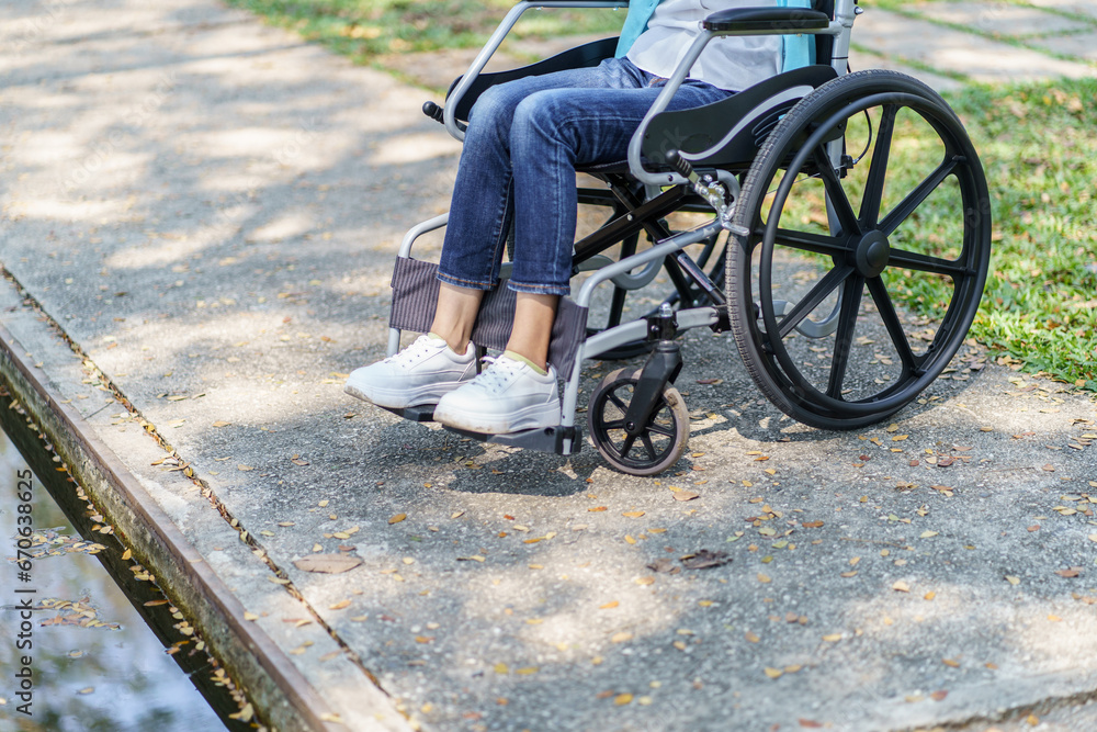Obraz premium Depressed sad asian woman in wheelchair&nbsp;lonely disabled adult