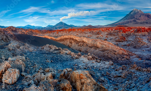 Mount Licancabur Volcano and colorful mineral deposits. Viewed from Valle de la Luna in the Atacama Desert region of northern Chile  South America.