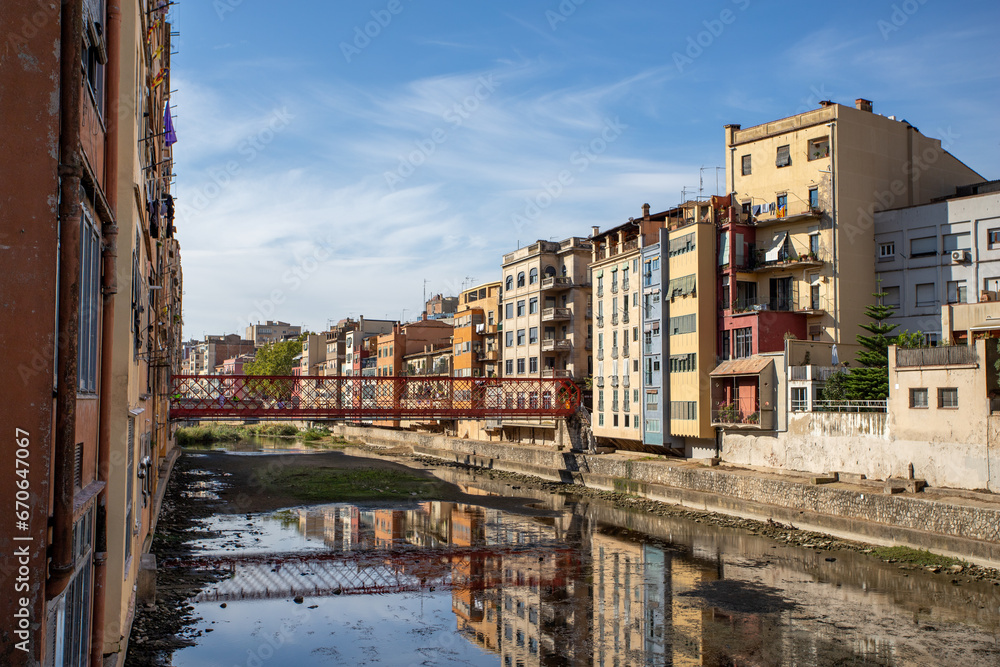 The river with old colourful houses in the city centre of Gerona, Spain.