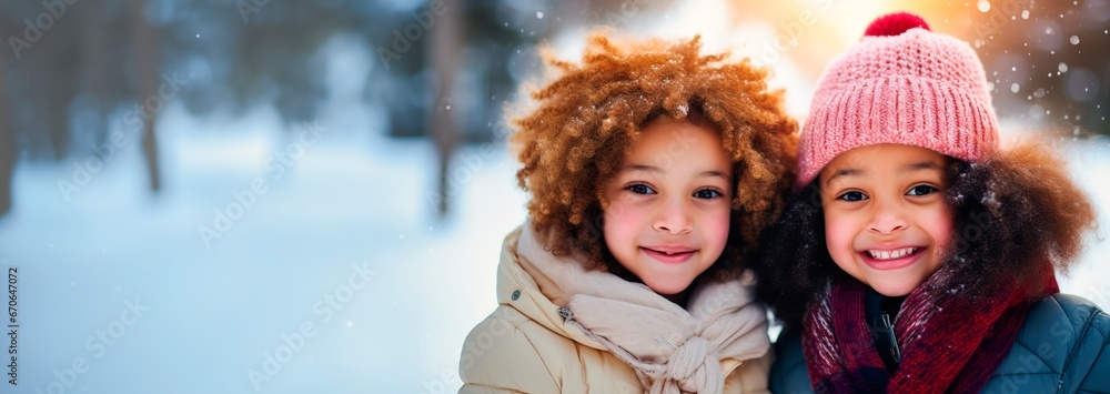 a couple of multicultural young children laugh together in the snow in winter, copy space for text
a couple of multicultural young children laugh together in the snow in winter, copy space for text