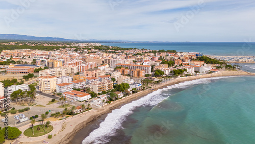 Aerial drone photo of the coastal town and beach in L'Hospitalet de l'infant in Spain