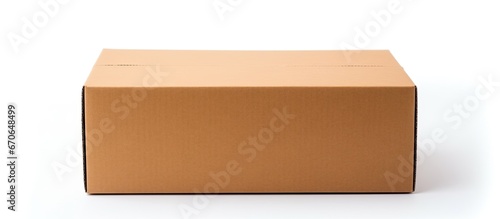A white background isolates a cardboard box that is closed photo
