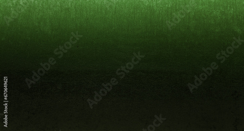 gradient background of dark black and shiny green fabric wallpaper looks like metal use as background. texture for luxury, rich mood and tone. black and green backdrop concept for deluxe design.
