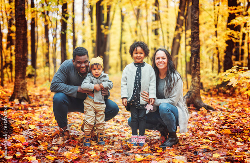 happy family playing on autumn park togerher