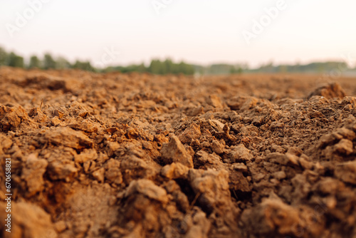 Black earth for plant background. Close-up of black soil prepared before sowing plants. Rural landscape.