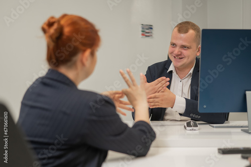Quadro em tela Business partners communicate in sign language