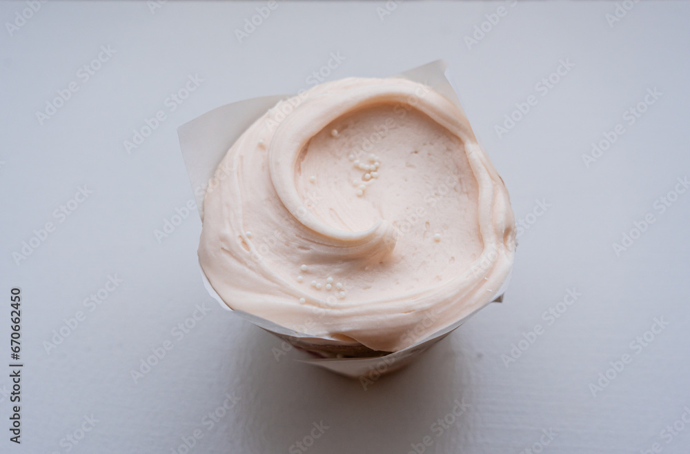 strawberry cupcake - strawberry frosting over vanila sponge cake