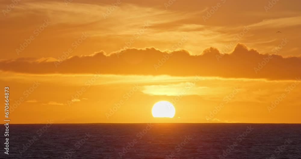 Sunset over ocean zoom in real time video, close up big sun setting horizon natur backgroung Sunset over ocean zoom in real time video, close up big sun setting horizon natur backgroung