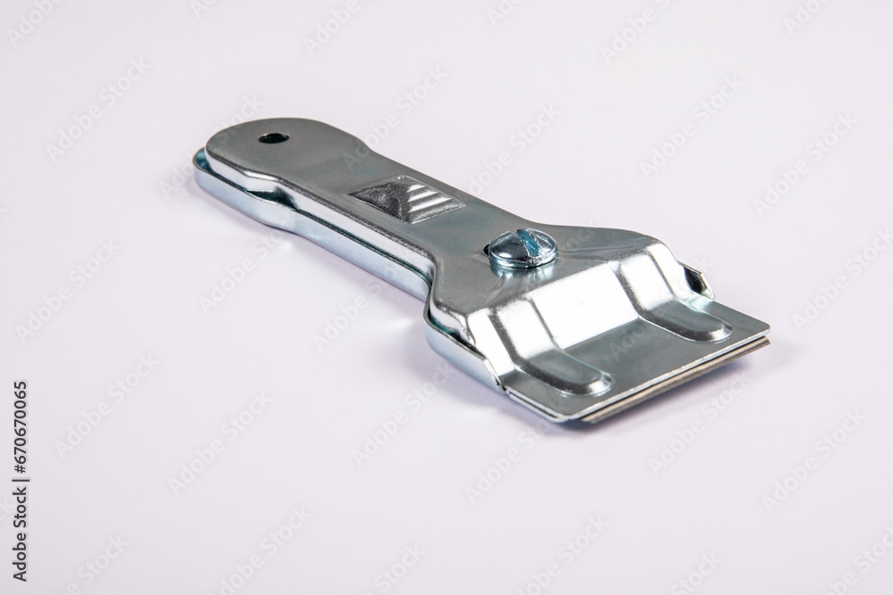 Glass ceramic scraper on a white background Glass ceramic scraper on a white background