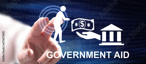фотографія Woman touching a government aid concept