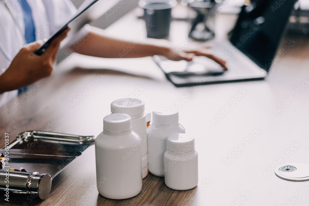 Medical technology concept. Doctor working with mobile phone and stethoscope in modern office Medical technology concept. Doctor working with mobile phone and stethoscope in modern office