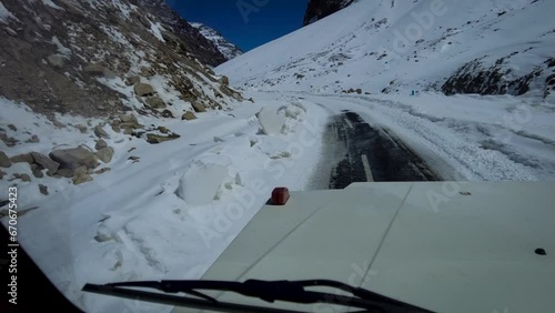 Snowy Shinkula Pass Drive: Embracing Winter's Serene Beauty photo