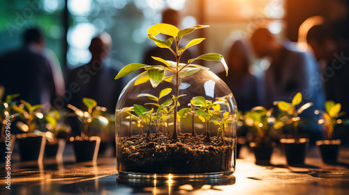 Foto An image of a young plant in a glass dome with people surrounding