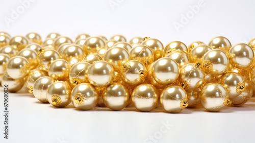 Elegance in Every Detail: Sparkling gold Christmas bump beads on a white backdrop, perfect for adding a touch of luxury to your holiday designs