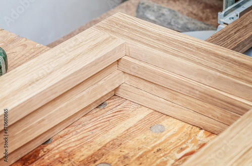 Wooden frames on workbench in carpentry workshop