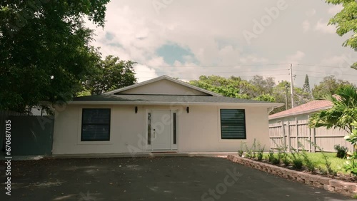 Home in Florida neighborhoods. real estate view. Move camera photo