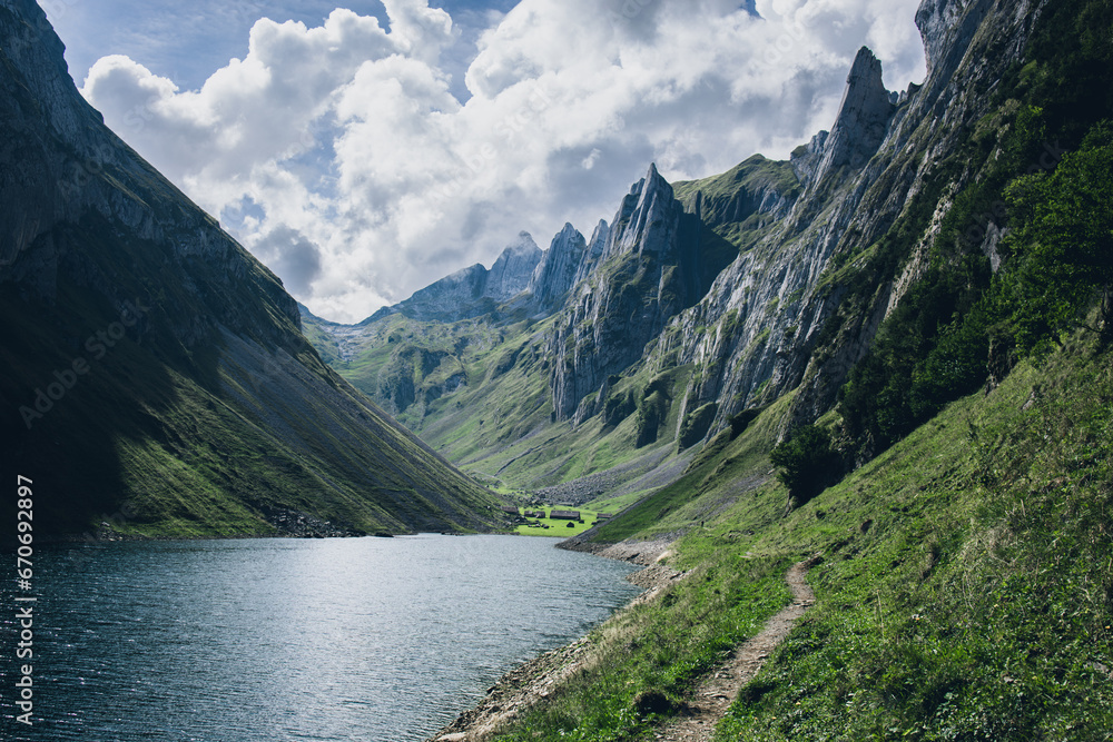 Nestled within a tranquil landscape, the lake unfolds like a liquid mirror reflecting the surrounding world. Nestled within a tranquil landscape, the lake unfolds like a liquid mirror reflecting the surrounding world.