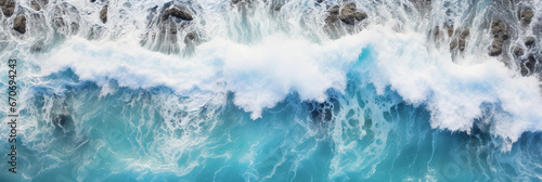 Aerial drone photograph, top-down view of waterfall plummeting into the ocean, turquoise water mixing with sea salt, slight vignette