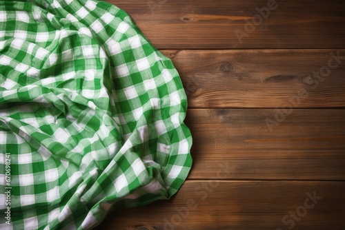 Green and white checkered tablecloth on a wooden table. Generative AI photo
