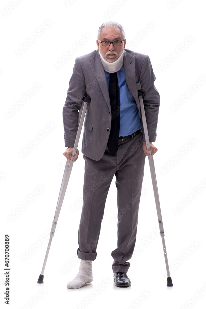 Old businessman after car accident isolated on white Old businessman after car accident isolated on white