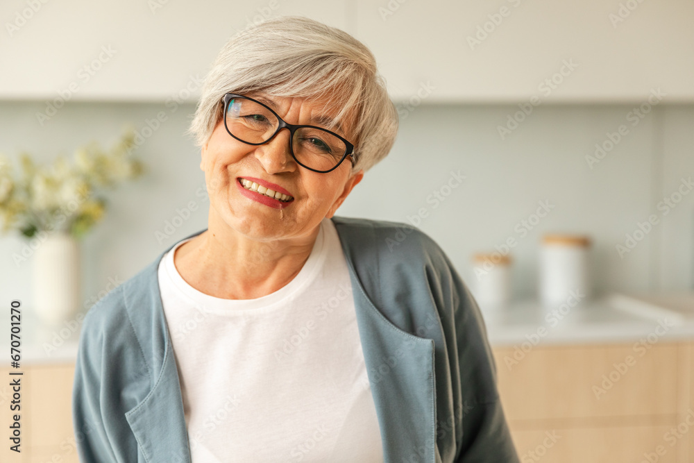 Portrait of confident stylish european middle aged senior woman. Older mature 60s lady smiling at home. Happy attractive senior female looking camera close up face headshot portrait. Happy people - obrazy, fototapety, plakaty 