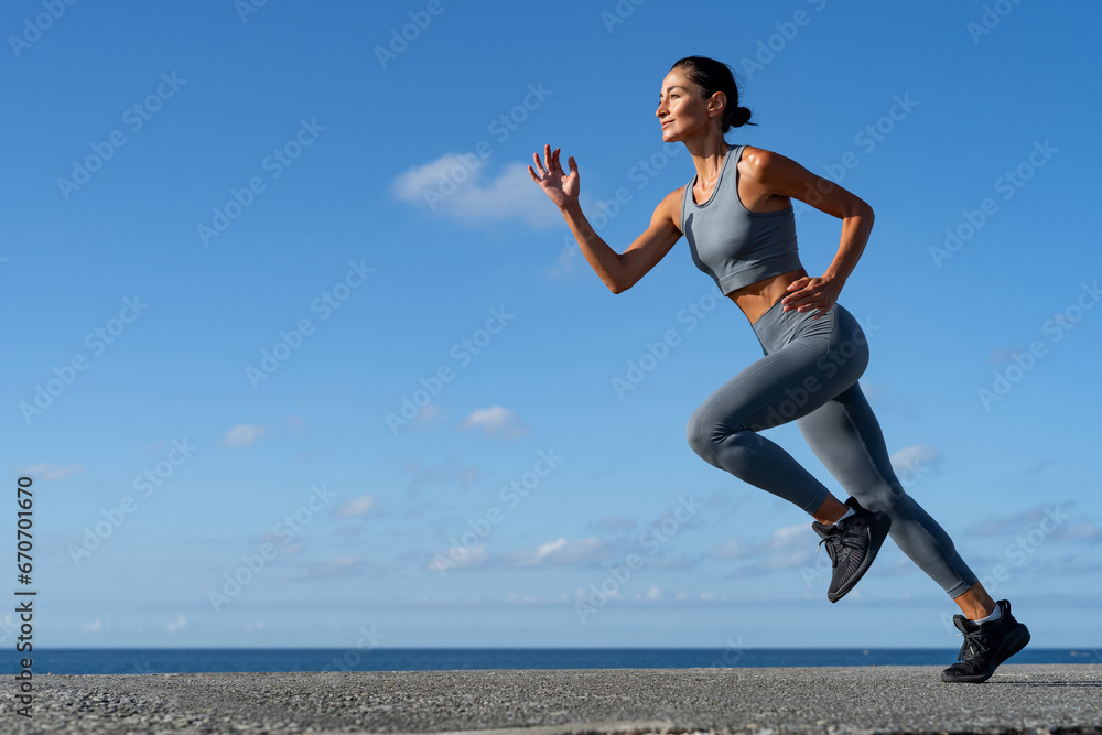 athletic brunette girl doing fitness doing exercises leading a healthy lifestyle