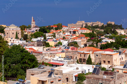 Stone towers and walls of old medieval fortifications on the island of Rhodes.