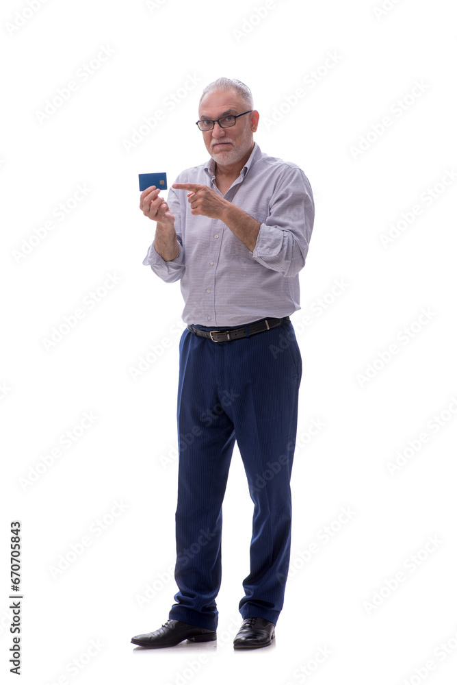 Old businessman holding credit card isolated on white Old businessman holding credit card isolated on white