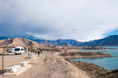 Car stop near the mountain lake in Mendoza province of Argentina