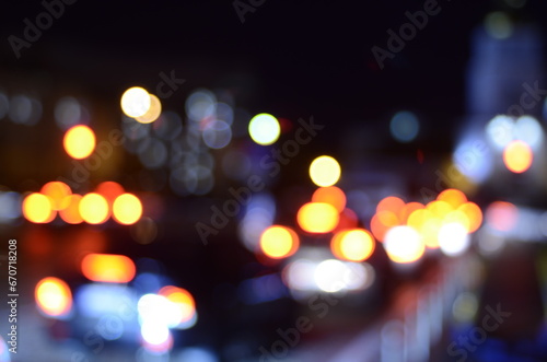 Blurred view of night city street  © Yurii Andreichyn