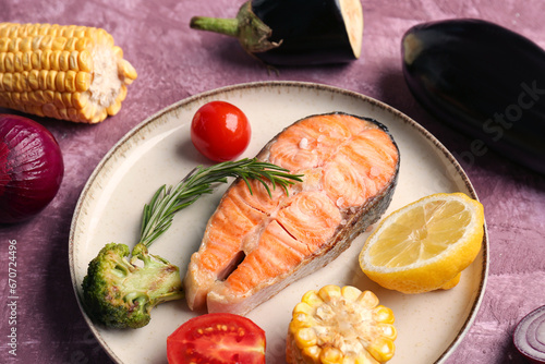 Grilled salmon steak with f...
