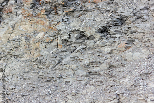 scree from the mountain on the shore stones from opoka, close-up texture