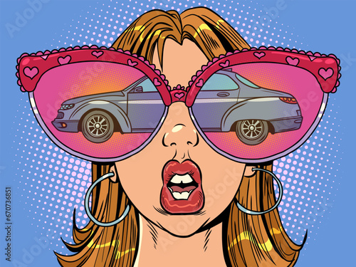 A tempting offer in a car dealership. Huge glasses and reflection in them. A woman with glasses looks at the car.