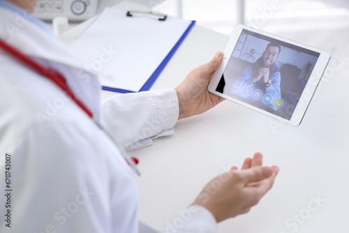 Female doctor video chattin...