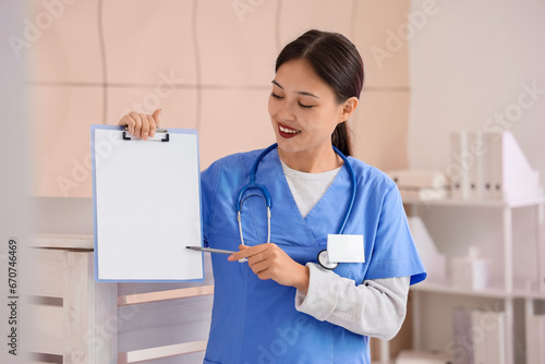 Female Asian medical intern...
