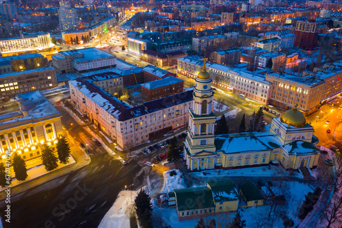 Aerial view of snow covered Lipetsk cityscape with central Cathedral square and Nativity of Christ Church in winter twilight, Russia