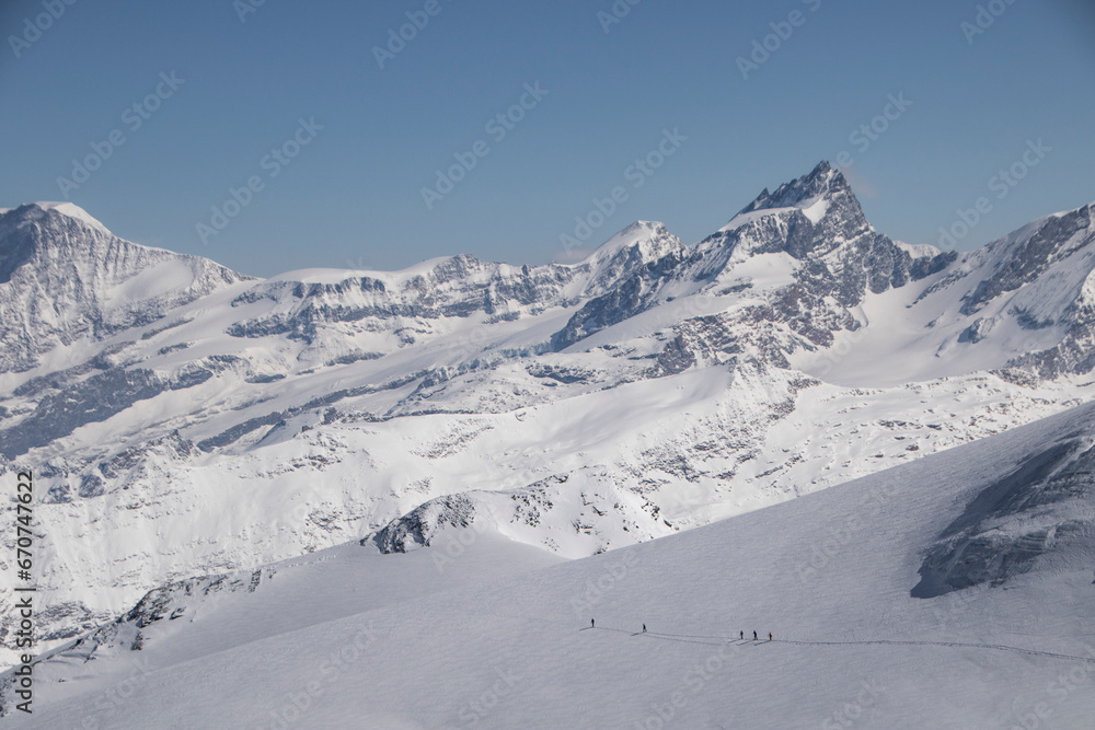 Mountain and landscape covered with snow against sky Mountain and landscape covered with snow against sky