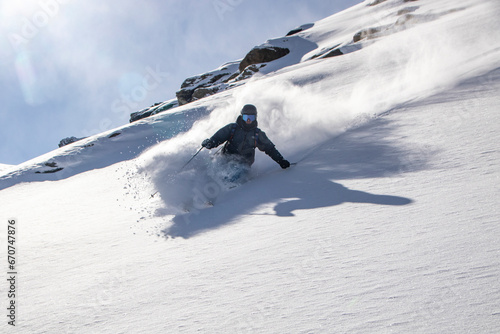 Person snowboarding on snow covered landscape during vacation