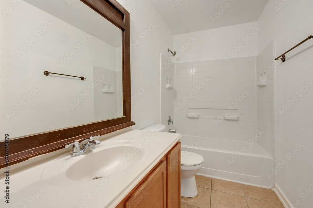 a home bathroom with a tub a home bathroom with a tub