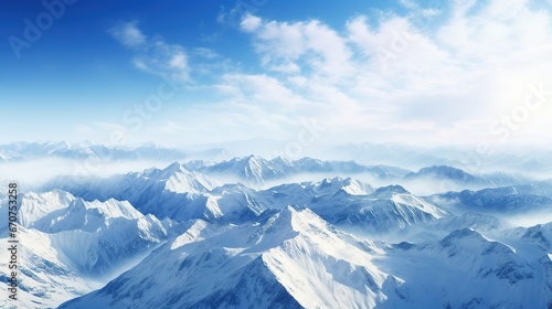 White snowy montains with blue sky, travel and vacation lifestyle, resilience and challenges concept © NoLimitStudio