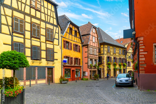 A picturesque street of half timber buildings in the Alsatian village of Ribeauville France.